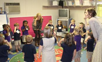 NEW SCHOOL PROGRAM - Students at Central Rayne Kindergarten participate the new Do-Re-ME! program, one of three schools in Acadia Parish selected for participation as instructed by the Acadiana Symphony Orchestra and Conservatory of Music. Instructor for the weekly class is Christine Balfa, left, and her assistant, Alyce Ray, right. 