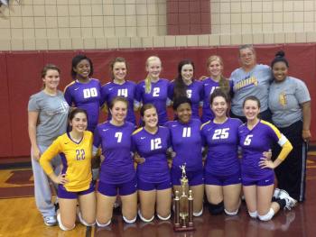 TOURNAMENT CHAMPIONS - Rayne High Lady Wolves who captured top honors over the weekend during the Jennings High School volleyball tournament include, kneeling from left, Mary Peltier, Taylor Arceneaux, Haley Comeaux, Niesha Domingue, Abbie Duhon and Sidney Fontenot; standing, manager Cee Jae Richard, Charlesha Dugas, Blair Bergeron, Katie Benoit, Layni Boudreaux, Charlyne Peltier, Coach Stephanie Garrett and manager Quintara Sinegal.