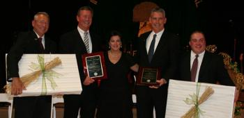  The 2013 Festival Honorees, Wayne and Michael Hensgens, second and fourth from left, respectively, are delighted to be recognized by, from left, Gene Williams, Romona Credeur and Jay Suire.