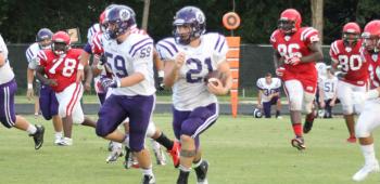 Rayne's Trent Duhon looks for running room during a recent game.