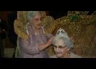 2012 Golden Age Queen Lillian Racca offers 2013 Queen Agnes Primeaux words of advice as she crowns her.