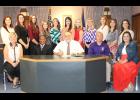 Joining Mayor Roland Boudreaux Tuesday morning at City Hall as he signed a proclamation for “Rayne High School Homecoming Week” were, seated from left, faculty sponsor Norellie Fontenot, Principal Wendall Prudhomme, Mayor Roland Boudreaux, Football Coach Curt Ware and faculty sponsor Paige Dupont; standing, court members Allison Arceneaux, Taylor Arceneaux, Tori Carriere, Haley Comeaux, Sidney Fontenot, Mia Guidry, Whitney Johnston, Katelyn LeDoux, Claire Menard, Mary Peltier and Kaitlyn Thibodeaux.