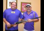 The Rayne Boosters are completing plans for the 3rd Annual Sporting Clay Shoot and Auction on Saturday, Oct. 26, at Ed’s Shooting Range in Kaplan. Displaying the Beretta shotgun being offered during a raffle drawing are event co-chairmen Greg Doré (250-5598), left, and Blake Alleman (581-0017), right.